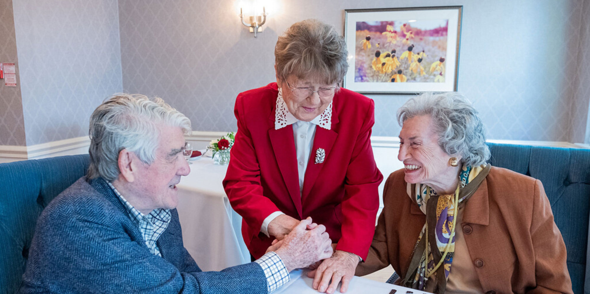 Three Lifetimes on Riverside Retirement residents smiling